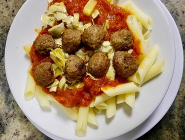 Closeup view of our meatballs pasta dish